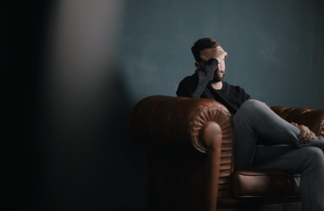Psychologist - controversy of mental health diagnosis system The Thrive Programme - unhappy man